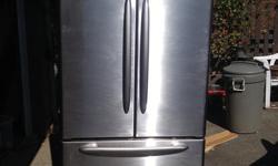 Great condition Maytag French Door style stainless fridge. 35" wide, 31" deep and 69.5" high. In terrific working condition, virtually like new. Internal ice maker and filtered water. Renovating and no longer need a larger fridge. Small crack on internal