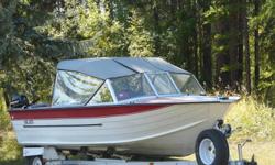 White and red, remodeled oak interior, near new canopy, 140hp Mercruiser, 6 hp Mercury, Easy Loader trailer (3 new tires). If interested, please call (250) 426-4728 or email me at mailto:jcsandberg@shaw.ca