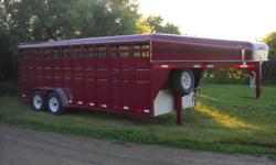 2012 S&S 20' x6'8" stock trailer, 7000 torsion axles,electric brakes, 16" 10 ply radial trailer tires, sides have 1x3 uprights so very strong walls!,
pine floor , has center gate with 1/2 slide cut door in it, 1/2 slide swing rear doorwith slam latch,