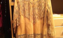 Perfect condition. GREAT FRINGE on front and back and sleeves.