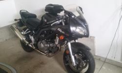 Up for sale is our 2006 Suzuki SV650S. It is in good condition and has less than 30,000 kms. It has been regularly maintained with oil changes, etc, and has new tires as well. We have all receipts for maintenance performed on the bike since we have owned