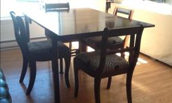 Wood table, 3 extra leaves, 38"w and can expand from 40" to 76" long if needed. Price includes 4 chairs, recently re-covered, very comfy. Changing decor and need to sell this week to make room for new set.