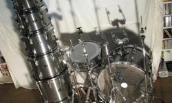 Tama "Swingstar" drums "Made in Japan". Metallic Grey. Includes 10", 12", 13", 14" Toms, 16" Floor Tom all with brand new Evans black hydraulic 360 heads. 14" Snare with brand new Evans HD head. 22" Bass drum with double kick pedals. Snare stand, Tom