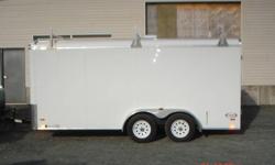 Kargo Max tandem trailer, 7'X16' with 6'X8" ceiling. Excellent for work on the go. Has roof racks for ladders, Barn style doors on back and right side. Electric 4 wheel brakes. Riveted free exterior seams perfect for decals. Undersides are protected with