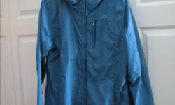Size XL this rain jacket is waterproof and breathable. Teal colour with adjustable hood and lots of pockets. Machine washable, hang to dry. Hip length.