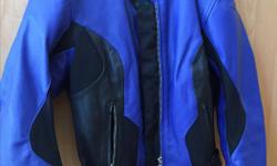 Women's Teknic Electric Blue Motorcycle Jacket in perfect condition rarely worn. Leather with vented, protection padding, very comfortable. Size 10 / 38. Small fitting. Removable vest.