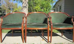 Three timeless tub chairs with a rich green velvety upholstery and beautiful wood detailing.Sturdy, no tears.Asking 150.00 for the trio.