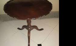 Parting with a fine old friend
Dk. Cherry finish Tilt Top table
adds grace to any room!
Antique repro. Claw foot.
A few bumps along the way reflected in the price
Good solid tilt mechanism, and a gorgeous piece
of functional furniture!