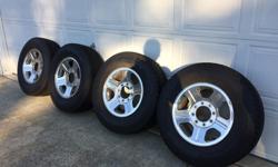 Toyo WLT1 open country
LT 275/70R18. 75% tread
With Ford Mags, 8 stud chrome caps