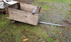 As the title says, trailer suitable for use behind ride on tractor or ATV. Homemade from a steel sack barrow with wood box. $25 OBO. See my other listings for snowplow and ATV.
