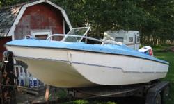 1970's (not sure of exact year) Fiberglass tri-hull open bow boat with 70 hp Johnson OB, tandem trailer with walking suspension and shocks, kicker plate for smaller trolling motor, 70 hp Johnson has bracket for steering kicker motor.  The trailer is