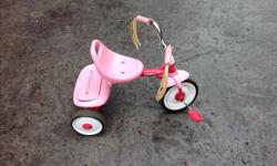 Pink tricycle