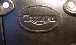 Triumph bags off a Triumph T100 (Bonneville). Sold new for $549.00 + $25 Handling + Shipping (USD) from Triumph.
Have chrome brackets to fit these bags to a Triumph Cruiser as well.
8/10 Condition. One corner scuff, two tiny (factory) holes for attaching