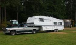 I have a Dodge Ram 2500 with a cummins diesel engine. And a 31' Komfort 5th wheel camper with queen bed and 1 Super slide. All appliances work comes with A/C. This unit is in Good Used Condition. If you have any questions or would like to see more pics