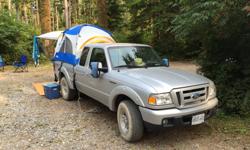 Napier truck tent. Excellent condition, lightly used. Fits small truck such as a Ford Ranger. Mattress conforms to truck bed.