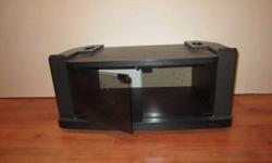 Black TV stand with black glass doors.  $20 OBO