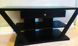 TV stand in new condition to big for our sons bachelor pad, dimensions are 107x40x51 cm call or text 2506340288 or email donna.lm@shaw.ca ask for Donna