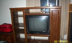 I'm trying to get rid of my tv and entertainment stand because it's just too big for my apartment the TV is a Prism quiet a few years old but still works and the entertainment stand is good and solid.Can also hold movies on the right side.