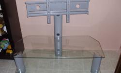 I'm sellingTechcraftÂ® LCD TV stand that I bought 6-8 month ago for over 350$, selling for 120$ obo.
Fits perfect for TVs from 37" to 56" . It is really modern looking tv stand.
The clear glass and silver steel frame makes look very nice. Looks like is