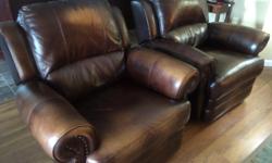 Two large and very comfortable Costco Leather/Vinyl reclining chairs. Paid $900 each. Will sell for $175 each or $300 for the pair. Well taken care of and in almost new condition. Please contact us for more information and to view.
Thank you!