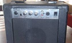 Tyga-10 Typhoon guitar Amplifier measures 10.5 by 11 high UL approved, works perfectly 50.00
