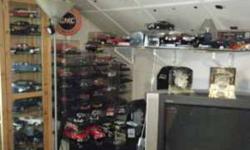 For sale "Ultimate Man Cave" Everything for the car guy up to $17,000 worth in die cast model cars, framed auto memorabilia 50 wall plates 5 wall clocks old license plates 24 display boxes garages led display glass so much impossible to list it all but so