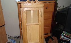 Corner cabinet started for a clock.  Needs to be finished with clock face and pendulum, as well as glass front.  Door is hinged on.  Front is made of oak.  Beautiful design and craftsmanship. 
Make an offer on this.