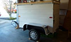 Utility / Cargo Trailer 4' x 6' inside, Plywood lined, metal outside with wood rack for carrying longer items.  Newer 13" tires, solid heavy duty frame, good wiring and new lights.  Pulls very easily.  Also comes with spare tires.
 
Asking $400.00 obo