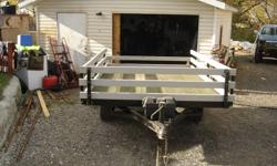 Utility or Quad trailer with removable side rails and loading ramp. 6 1/2 feet wide by 10 feet long. $1500 O.B.O. Call 250-919-3506 or 250-919-6418