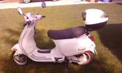 2006 Vespa LX50 - 49 cc., white, 2540 kms. Comes with helmut, CD with owner's manual and parts catalogue, new battery, all-weather cover. Good starter, runs well. Used only for camoing. Am selling due to health reasons.