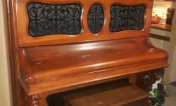 This Emerson piano built in 1877. It was built in Boston , Massachusetts.
The Emerson Piano Company built high quality, expensive pianos and used exotic woods and superior workmanship.
It is a very beautiful piece of furniture.
Piano bench comes with it.