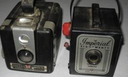 Two Classic 1950's Box Cameras. Brownie Hawkeye Flash model and Imperial Six-Twenty Snapshot camera
$90 for both! Offers?
Imperial - Six-Twenty Flash Camera - Made by Herbert George Co., Chicago 6 - U.S.A.   - Handle strap still intact
Not sure about
