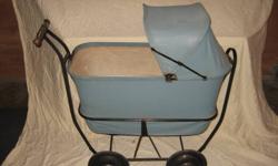 VINTAGE FABRIC BABY BUGGY
Has some very small tears and is missing one wheel cap but you won't be disappointed!
44 inches long
40 inches high
20 inches wide
Price:  $95.00
Call:    Dennis @ 604-250-1006