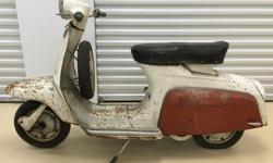 Vintage Innocenti Scooter, very solid body, with pirelli tires. Sorry I don't know anything about this scooter, I haven't tried to start it but I am pritty sure it wouldn't start as it has been sitting in a climate controlled storage for years now. I