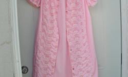 downsizing in my Shop (RETIRING) lots of vintage Intimate Lingerie, this Nightie was never worn, this nice pink cotton Nightie or Robe has beautiful Embroidery and Buttons in front, this vintage Nightgown is MADE IN CANADA it is on Sale for $5
click on *