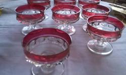 Collectable King Crown ruby thumbprint  glasses, plates and sherbets.
4 water/large wine glasses
8 small wine glasses
8 sherbet
8 luncheon plates
Excellent condition.  Take the whole collection for $90, OBO