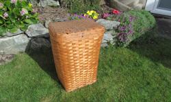 . Vintage laundry hamper woven of alternating 3/4 " and 1 1/2 " bands of split wood.
. Tapered body.
. Top lid works well, hand crafted wire hinge.
. Sturdy wood bottom.
. Dimensions:
- Top opening: 20 " wide x 17 " deep.
- Height: 28 ".
- Bottom: 15 1/2