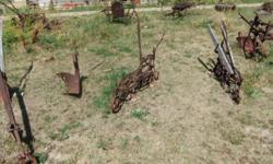 Walking Plows/Cultivators
 
Rebuild, paint or decorate as is.
 
Your choice---$100.00/each OBO