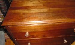 Beautiful grain in this Solid wood Canadian furniture
Recently refinished
Chest of drawers
dimensions are 45" high 30" wide and 16" deep
Construction is dove tail and doweling
The wood seems to be walnut
The handles are all original and solid wood
I left