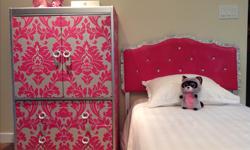 Beautiful bedroom set in pink, silver and rhinestones. Wardrobe has two bottom drawers and a shelf in the body. In great condition. Perfect for your little princess.
Headboard is 38" w X 38" h. Wardrobe is 30"w X 45 1/2" h X 16"w.
Will sell separately ~