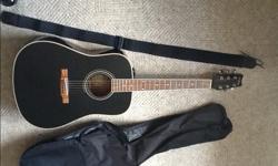 Great little guitar, had it for years. Lovely sound and a great price. Hard to beat the quality. Comes with Strap, Soft gig bag and pick holder. Does have have electric pick ups, straight acoustic. Come check it out. 250 727 7617. Elixir strings on it as