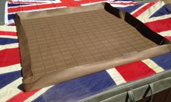 $75 OBO - FOR SALE ONE USED TAN COLOURED WEATHERTECH REAR CARGO LINER FOR 1987-1995 RANGE ROVER COUNTY/CLASSIC.
This is a used original clean WEATHERTECH REAR CARGO AREA FLOOR MAT LINER to keep your Range Rover cargo area floor protected.
It has 2 1/2