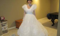Wedding gown made in Italy with Italian lace, in excellent condition and professionally cleaned.  $200.00 or best offer