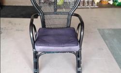 Black wicker chair with cushion.
Contact Helen/Bob