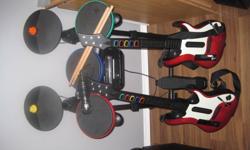drums with sticks , three games , two guitars , microphone. In great shape very little use.
