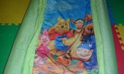Toddler size air bed with a Winnie the Pooh removable, washable sleeping bag cover.  From a smoke-free, pet-free home.