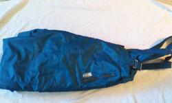 Woman Ski pants size medium, North Sky, adjustable straps, zipper pocket. turquoise, used twice for skiing