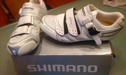 White/Silver spin / cycle shoes, Model SH-WR40 almost brand new!!! Worn 3X only. Paid $140 plus tax. PERFECT condition. Super clean.