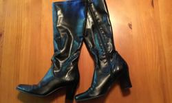 Tall, Black Boots. Excellent condition, barely worn.
I just can't wear heels anymore!
Size 8
Manmade uppers.