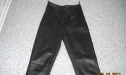Women's lined black leather pants. Near perfect condition, black in colour, size 6.